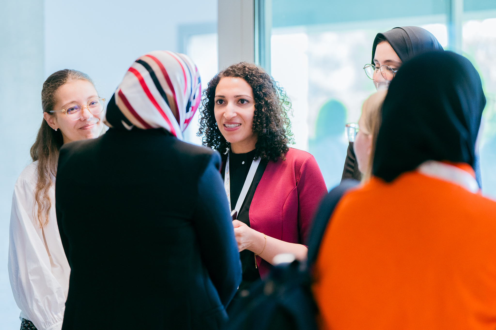 Dr. Zeina ElZein networking with delegates and entrepreneurs.